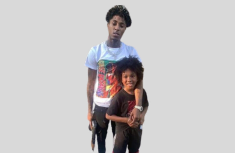 NBA YoungBoy Holding Gun With A Child