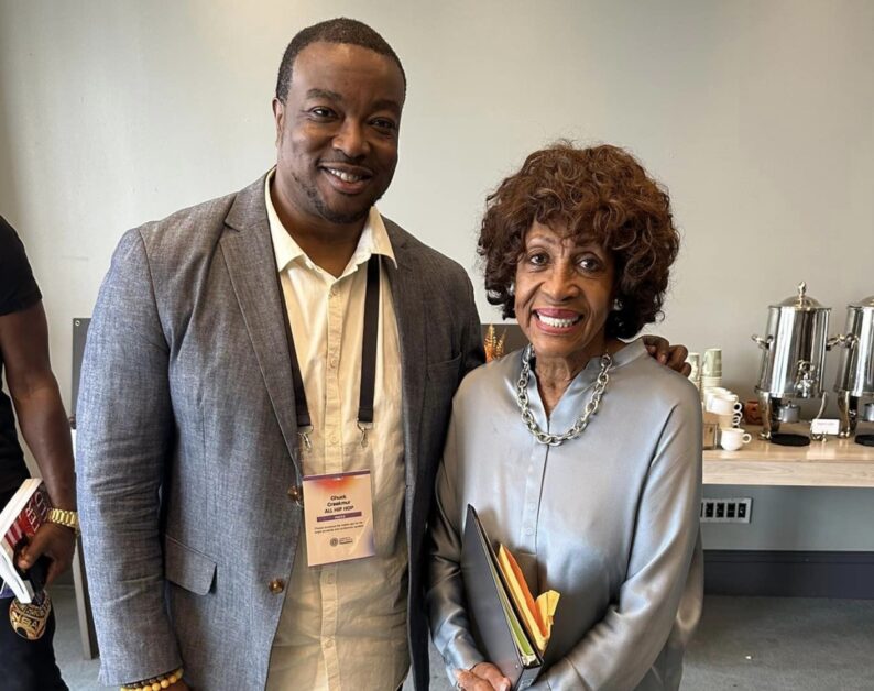 Chuck "Jigsaw" Creekmur, CEO of AllHipHop.com, and Congresswoman Maxine Waters